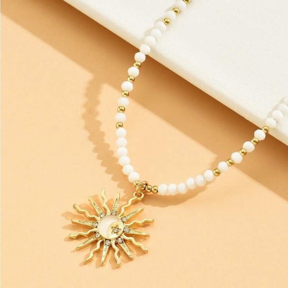 Anthropologie Gold and beaded White Necklace with Sunburst Pendant summer 2025 - Picture 4 of 4